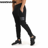 NANSHA Brand Muscle Fitness Mens Long Pants New Casual Cotton Trousers Exercising Bodybuilding Gyms Breathable Pants